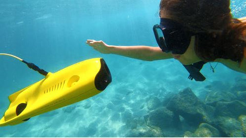 Gladius underwater drone and scuba diver